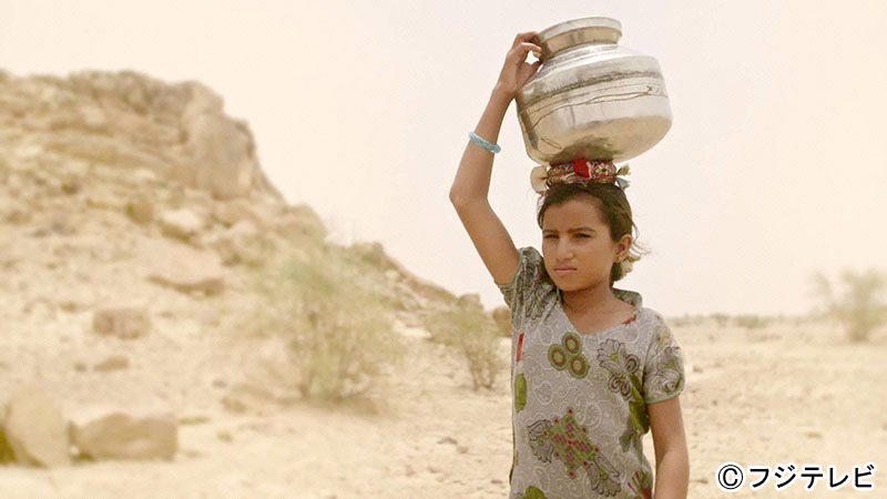 A young girl walks 10 kilometers through a desert, in the blazing heat for water.